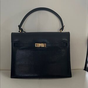 Sophisticated Black Satchel with Gold Accents